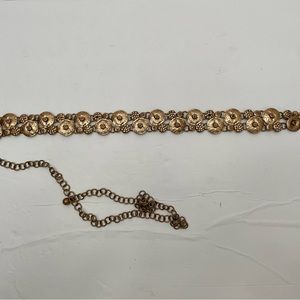 Goldstone and jeweled belt. Very heavy. Two jewels missing as shown. 50”